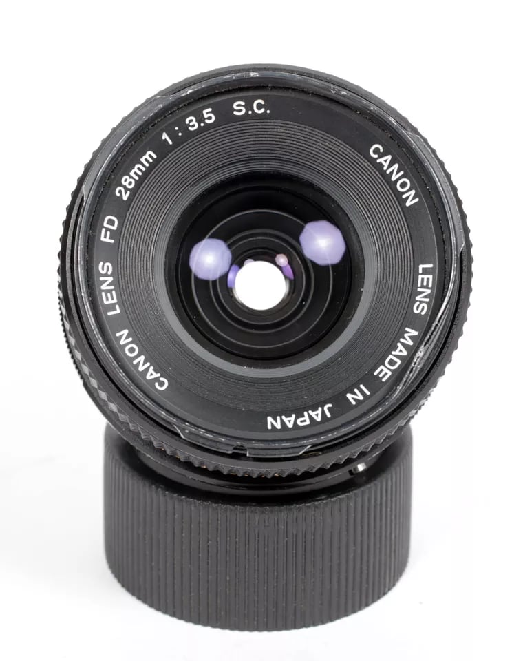 Canon FD/FDn 28mm wide angle lens for Canon FD mount cameras Canon FD/FDn 28mm wide angle lens for Canon FD mount cameras